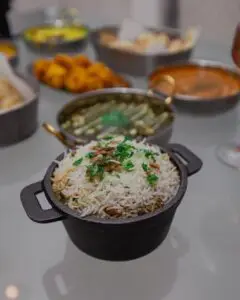 Curry, naan bread and onion bhajis served at Meghna Grill, Indian restaurant in St John's Wood NW8