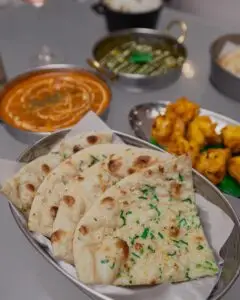 Curries and pakoras served at Meghna Grill, Indian restaurant in St John's Wood NW8